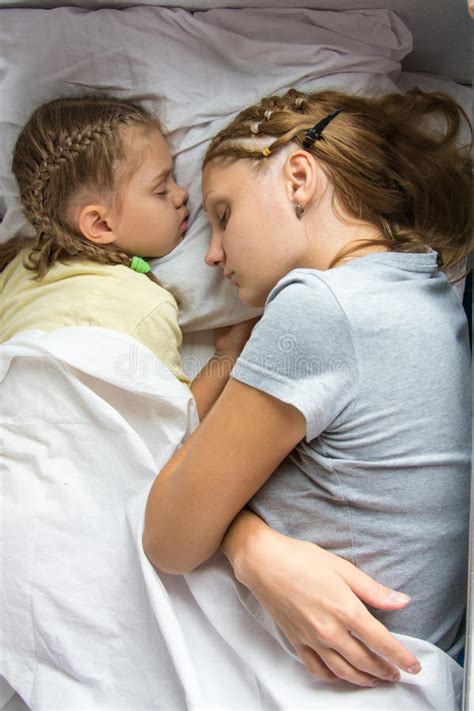 Mom And Daughter Sleeping On A Train Stock Image Image