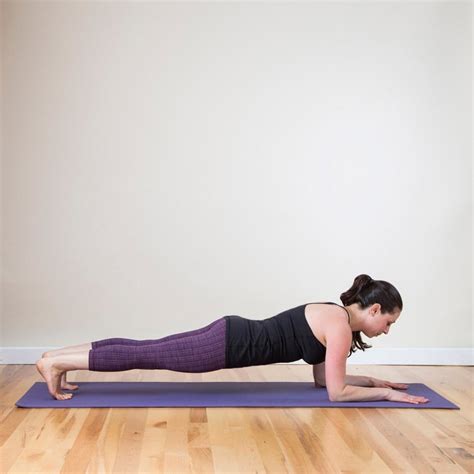 dolphin plank  minute full body yoga flow popsugar fitness photo