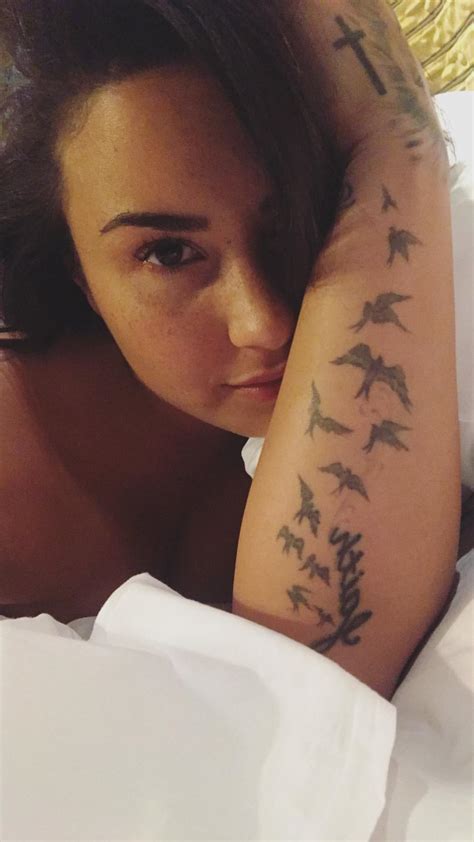 Demi Lovato Flashes A Nipple In Bed 4 Pics