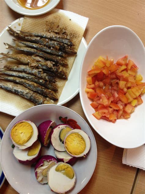 typical filipino breakfast tuyo dried salty fish red duck egg