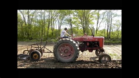 spring  farmall md plowing youtube