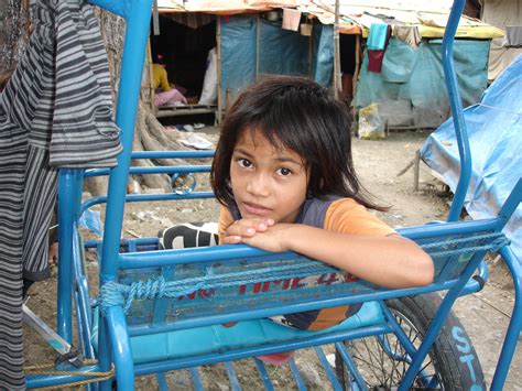 A Young Girl Looks To The Camera In Datu Piang Mindanao The