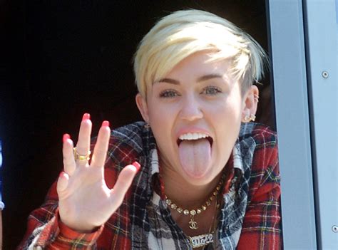 miley cyrus uses the t word talks sex and drugs again e online