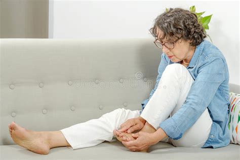 mature woman relaxing on a sofa stock image image of relax relaxing 72367009