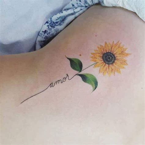 frase amor y flor de girasol tatuajes para mujeres