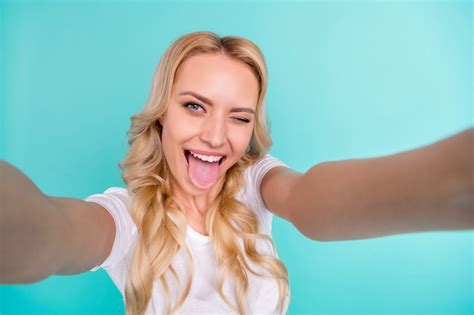 Premium Photo Cheerful Pretty Blonde Blogger Lady Make Selfie Show