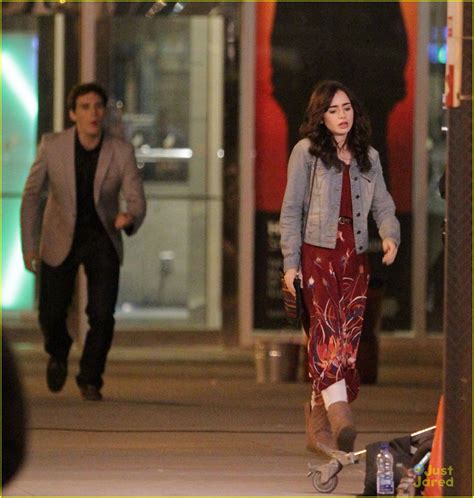 lily collins and sam claflin lover s spat on love rosie set photo
