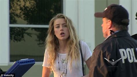 Amber Heard Flips Off Cops As She Gets Pranked By Johnny Depp Daily