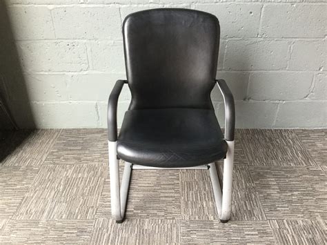 black leather effect meeting room chair recycled office