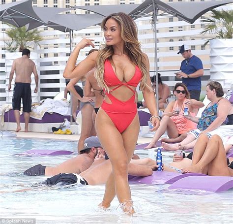 Daphne Joy Shows Off Her Curves In A Low Cut Swimsuit During Vegas