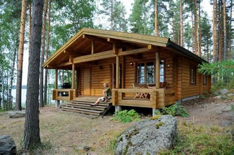 small log cabin log cabin homes log cabins family cabin cabin design river house stone