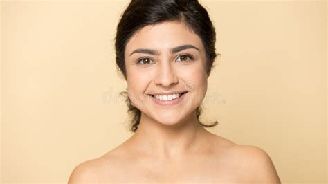headshot portrait of smiling indian woman naked on background image