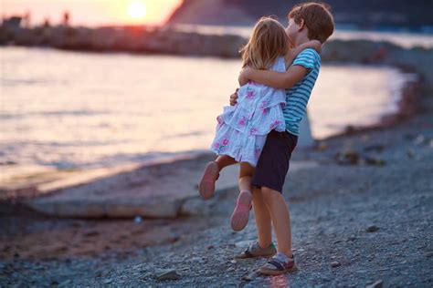 Why I Make My Sons Ask Permission Before They Hug Their Sister