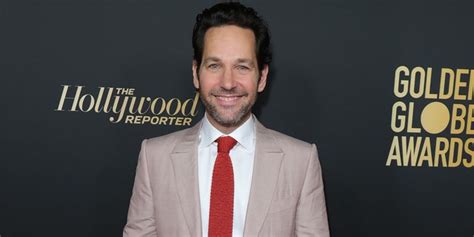 paul rudd hands out cookies to new yorkers waiting in the rain to vote