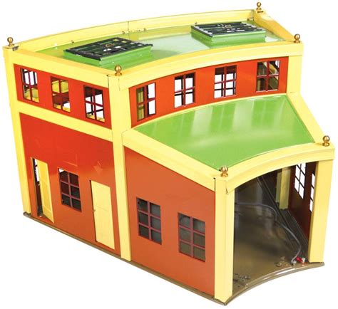 toy train station roundhouse section    reproductions painted steel lights  working doo