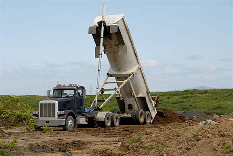 dump truck dumping stock  pictures royalty  images