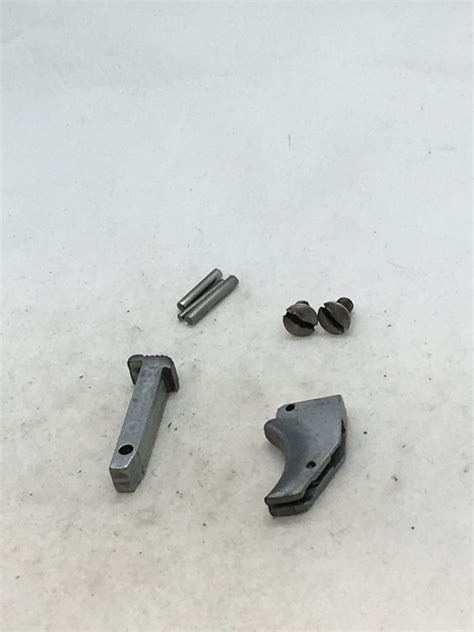 bryco model   pistol  screws  pins trigger mag catch postrock gun parts