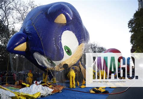 workers inflate  sonic  hedgehog balloon  preparing    macy  thanksgiving