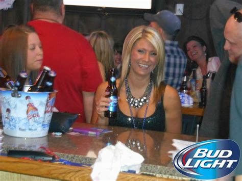 She Cannot Help But Smile With A Bud Light In Her Hand