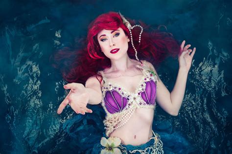 photographer brings disney princesses to life by taking photos of his friends in the water