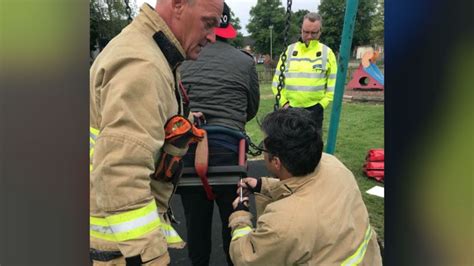 firefighters rescue man 20 stuck for hours in swing bbc news