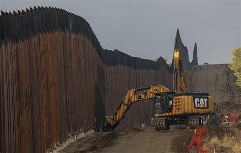 biden administration cancels military funded border wall projects