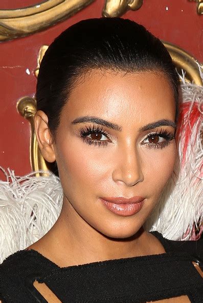 Kim Kardashian Classic Bun Kim Kardashian Updos Looks Stylebistro