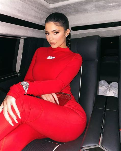 Kylie Jenner Wears Sexy Curve Hugging Red Outfit W1