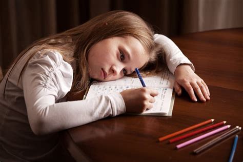sad kid  homework stock image image  paper girl