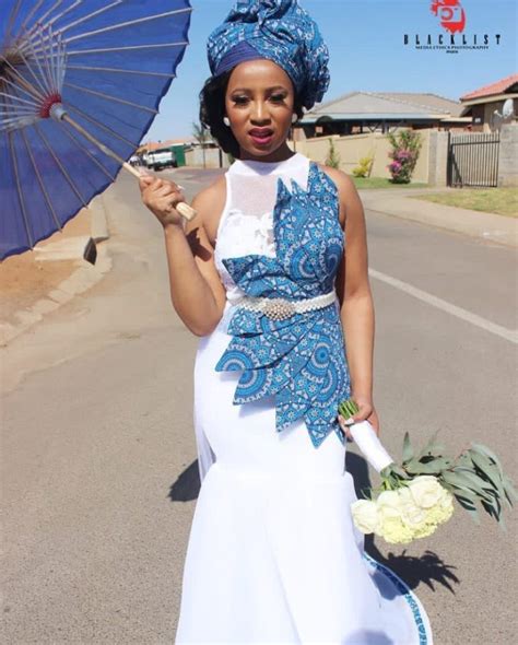 tswana bride in shweshwe inspired wedding dress and headwrap clipkulture