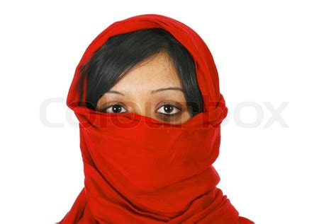young muslim woman covering  face stock photo colourbox