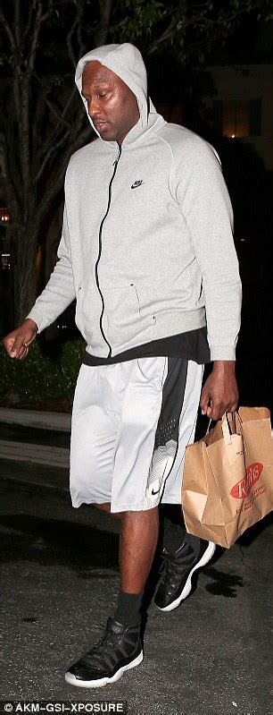 lamar odom appears downcast during solo shopping trip