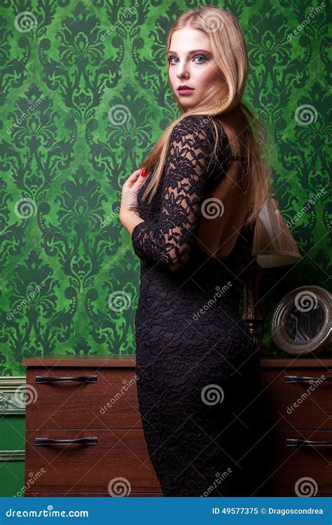 Gorgeous Sensual Girl In Black Dress With Naked Back Stock Image