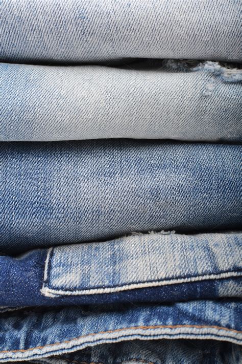 stack  folded jeans stock photo  jeans  denim beauty