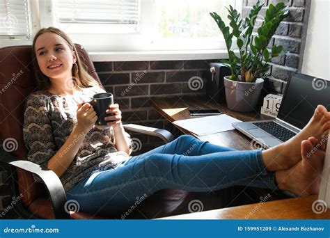 girl worker drinks tea  relaxes stock image image  laptop drink