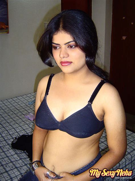 sexy neha nair in bedroom showing her assets off at indian paradise