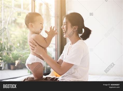 Asian Mom Smiling Image And Photo Free Trial Bigstock