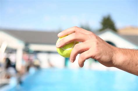 clean  swimming pool   tennis ball homemakingcom