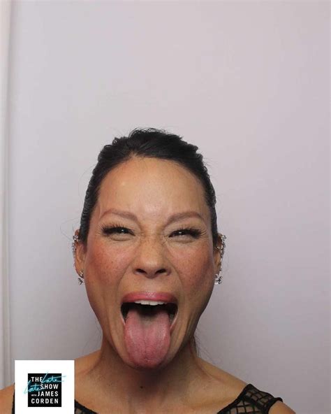 Lucy Liu Posing In The Photo Booth On The Late Late Show With James