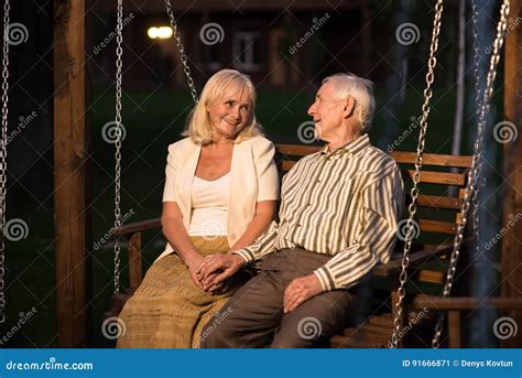 Couple Of Seniors Porch Swing Stock Image Image Of Bench Couple