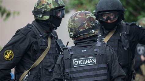 armed fsb officers search office of russian rights group the moscow times