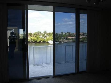 installing    window film  save money  energy costs window film sliding glass