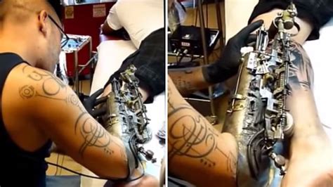 amputee tattooist has prosthetic tattoo gun fitted so that he can keep