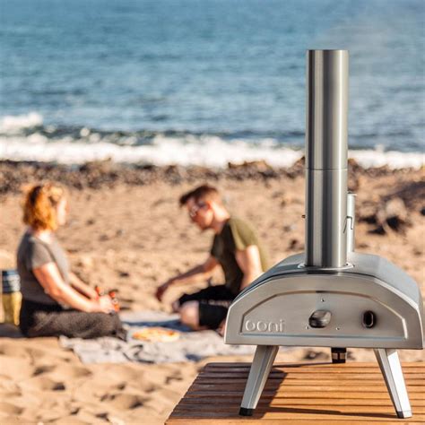 Ooni Fyra 12 Portable Woodfired Pellet Outdoor Pizza Oven Deluxe Kit