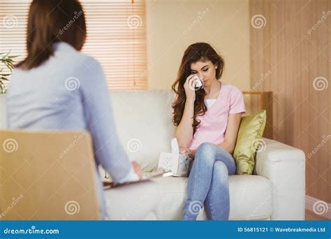 therapist listening to her crying patient stock image image of noting