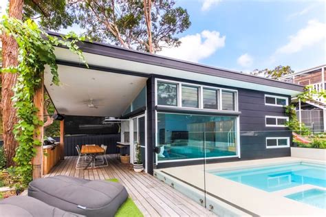 living big   tiny house luxury modern small home built  suburban backyard