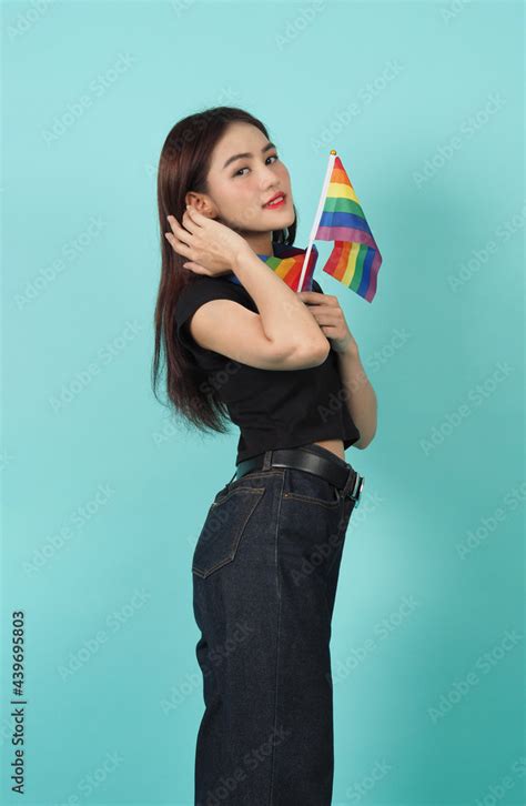 lgbtq girl and pride flag sexy lesbian girl and lgbtq flag standing