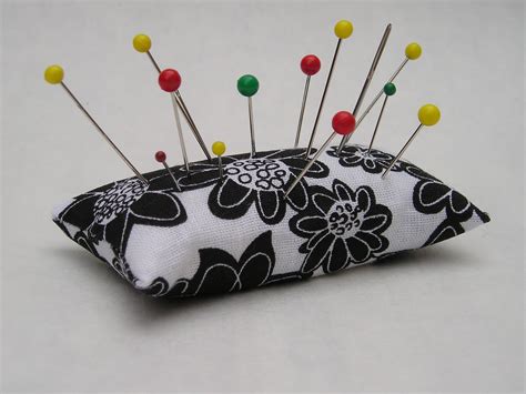 emery pincushion  pins  needles sharp sew  entry