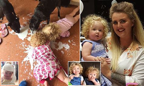 mother catches daughters licking milk off the floor