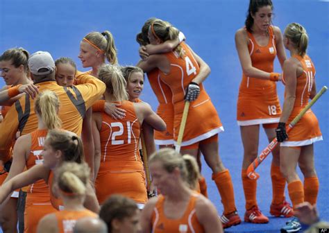 the netherlands field hockey team congratulates each other shortly